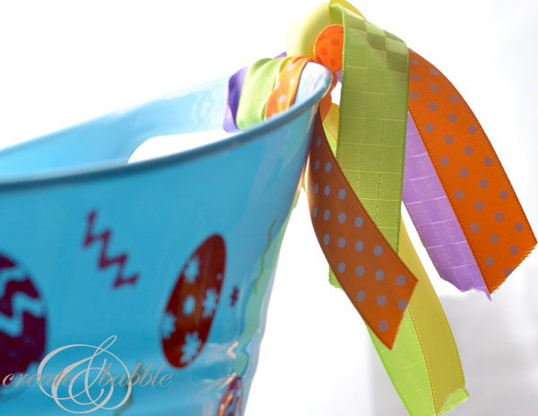 Vinyl decorated dollor tree bucket-createandbabble