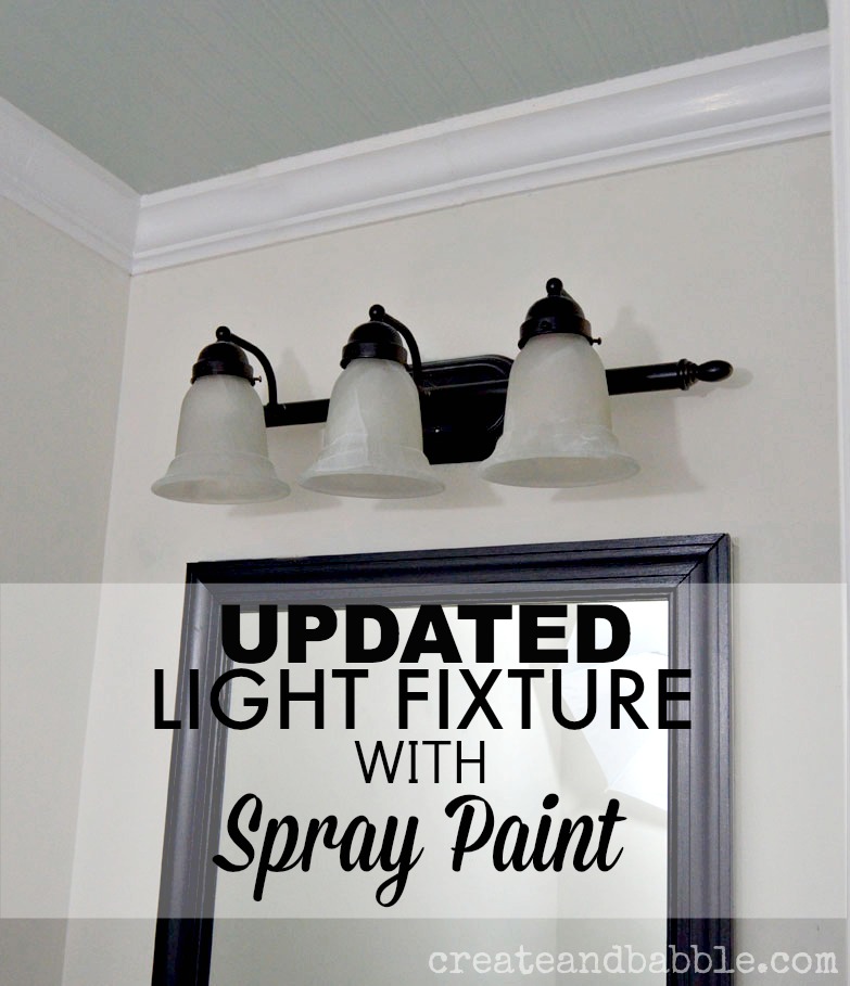 Spray Painting a Light Fixture Black For The Dining Room