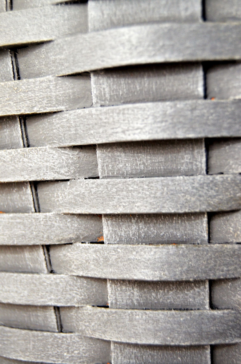 Liming wax and dark wax adds a grainy texture to an antiqued basket