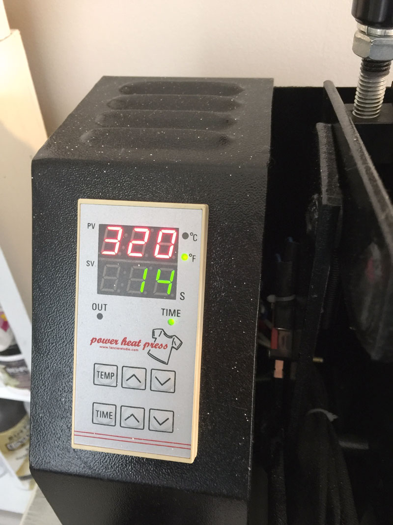 Using a heat press to attach heat transfer vinyl