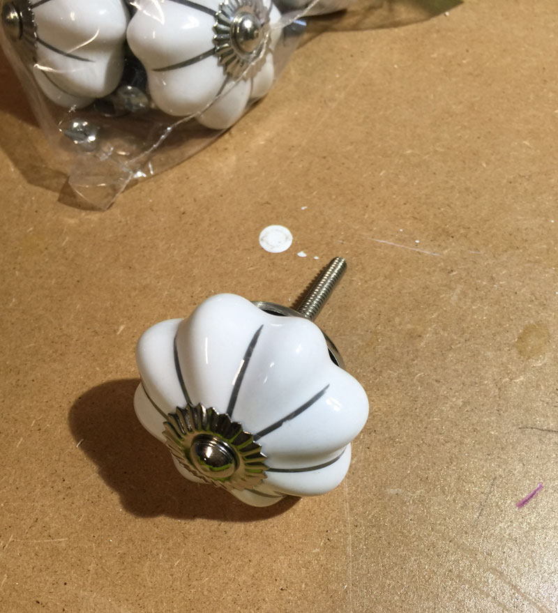 pretty knobs for upcycled cupboard door coat rack