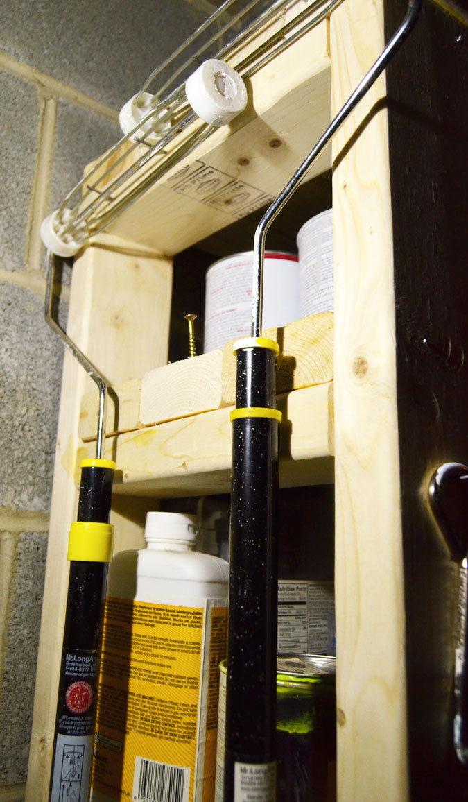 paint-storage-shelf-with-nails-for-hanging-painting-equipment