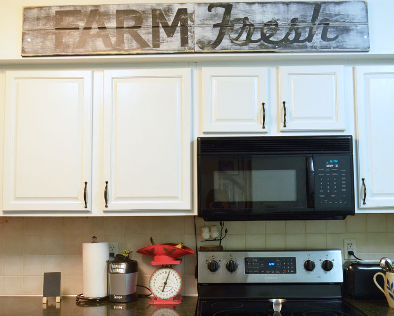 A stenciled kitchen sign using stencils made with silhouette studio