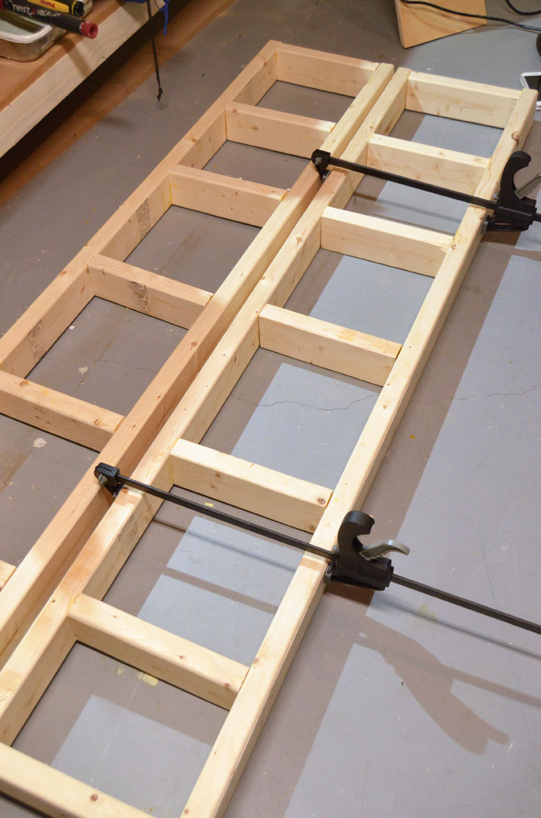 assemble sides of paint storage shelf built with 2x4s