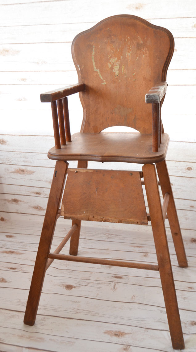 This old high chair needs repaired and restored