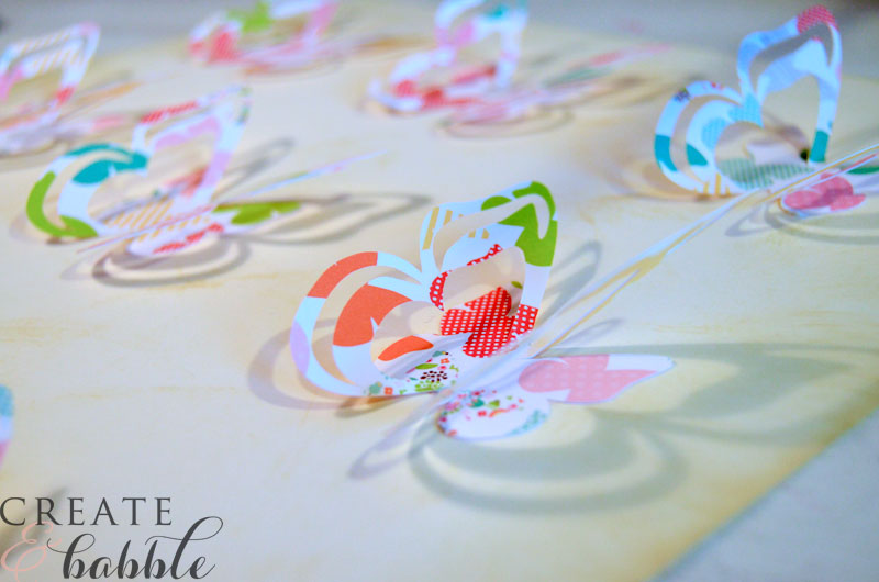 Butterflies attached to card stock for easy spring wall art