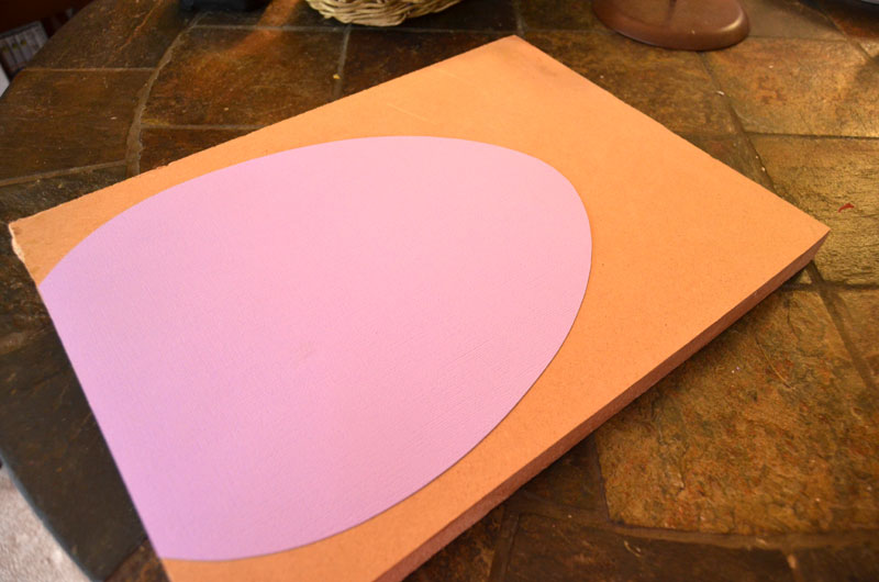 Trace egg shape onto wood to make wooden easter eggs