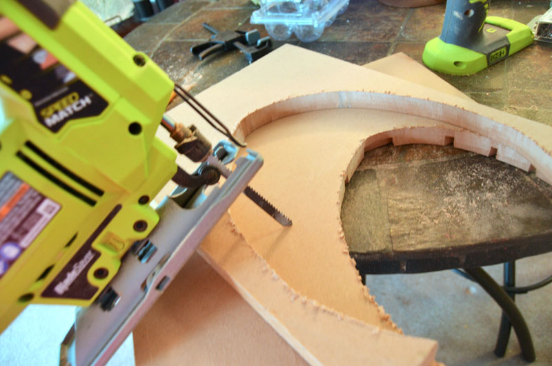 use a jig saw to cut wood into egg shapes for decorated wooden easter eggs