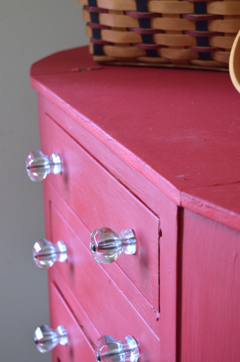 Red painted sewing cabinet