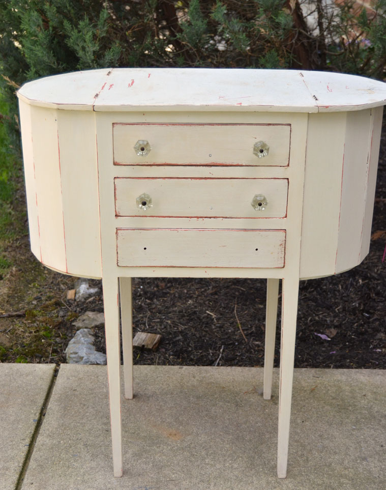 sewing cabinet with layers of paint needs a makeover