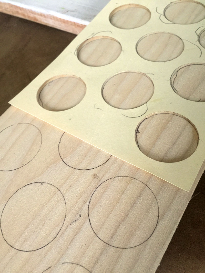 trace circles onto wooden sides of vinyl storage solution
