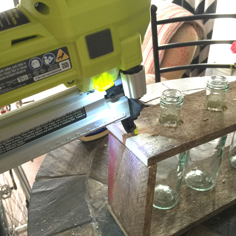 putting the diy vintage laboratory vase display together