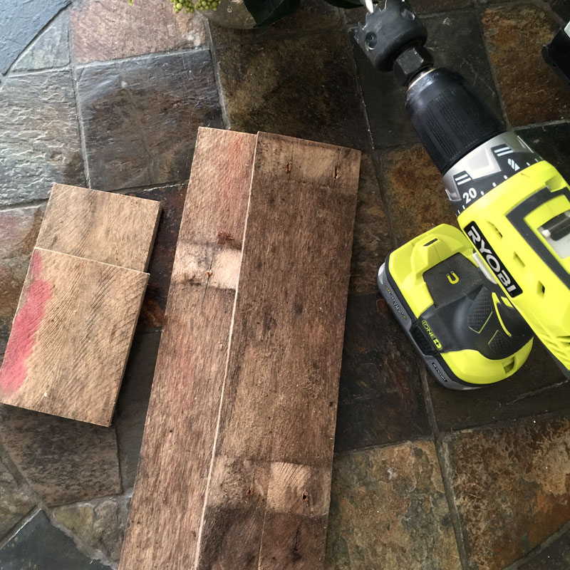 Cut scrap wood to make vintage specimen flower vase holder