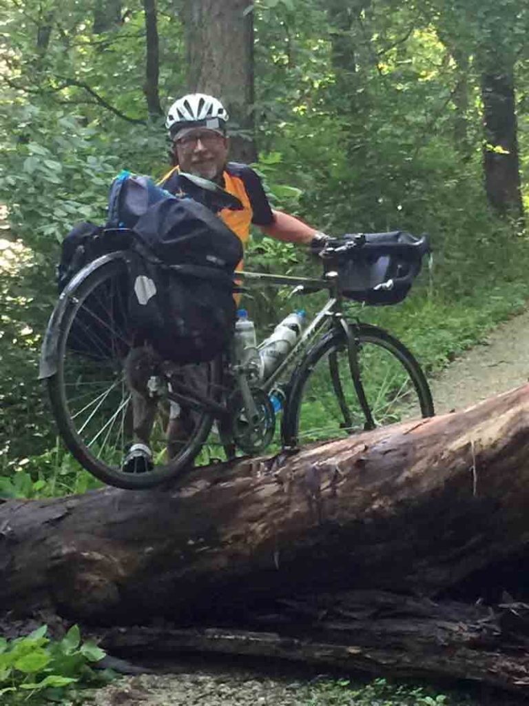 dan-carrying-my-bike-over-fallen-tree