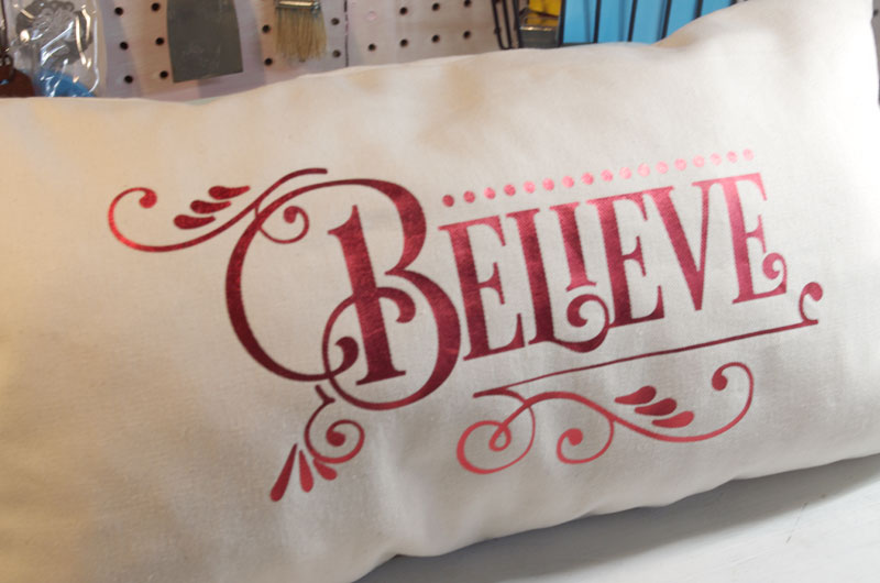 Christmas side of dual holiday reversible pillow