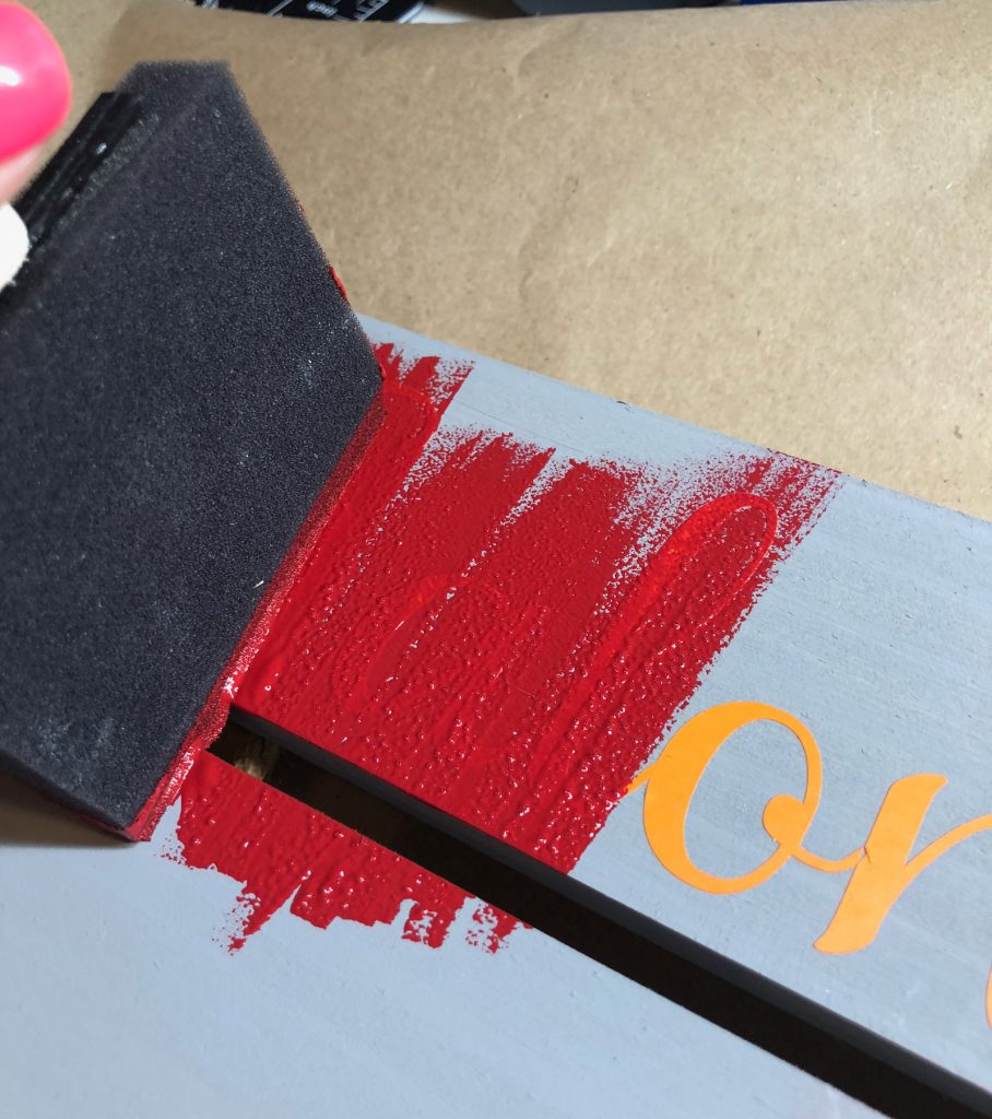 apply paint over letters with an up and down motion to avoid paint seeping under letters