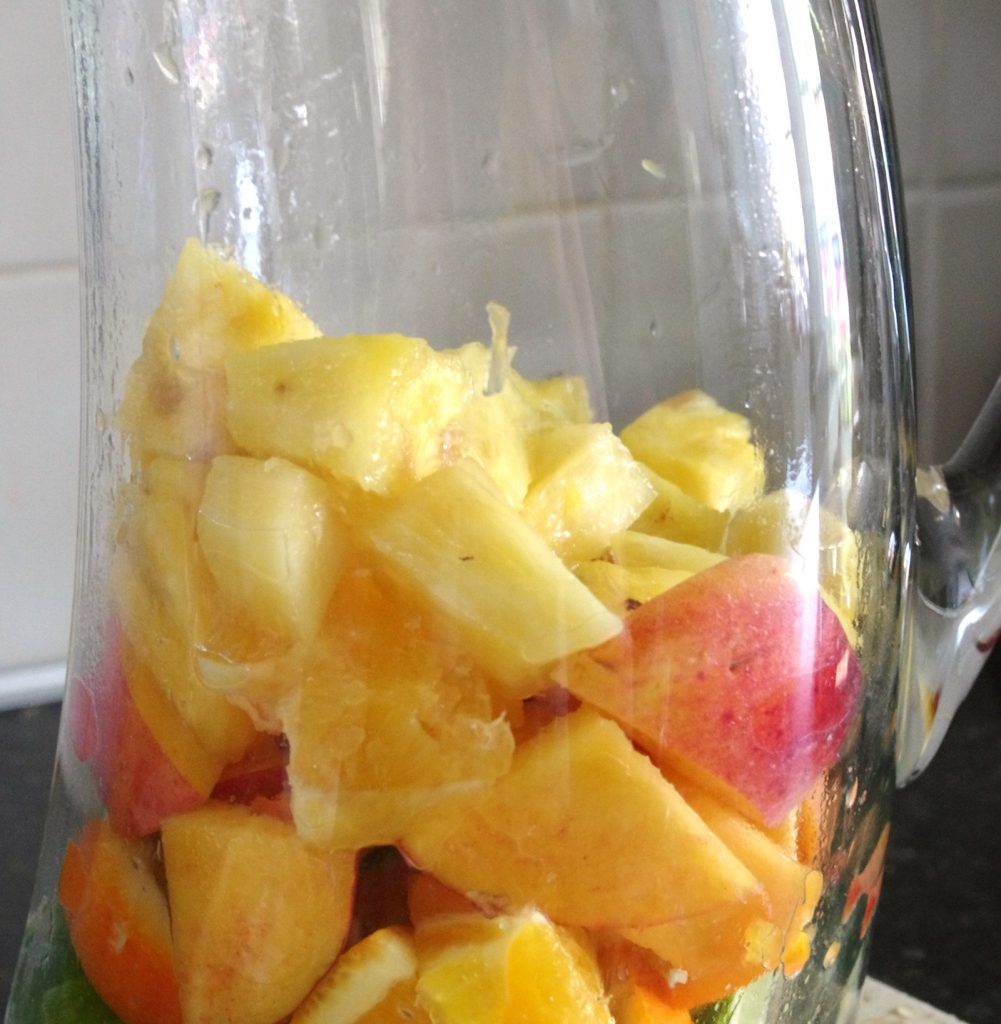 fill pitcher halfway with fruit to make white sangria