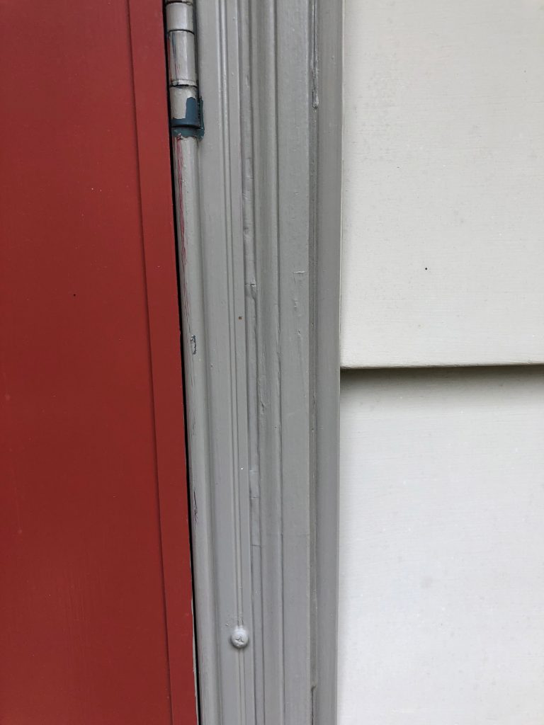image of door and siding to reference for paint colors for custom sign