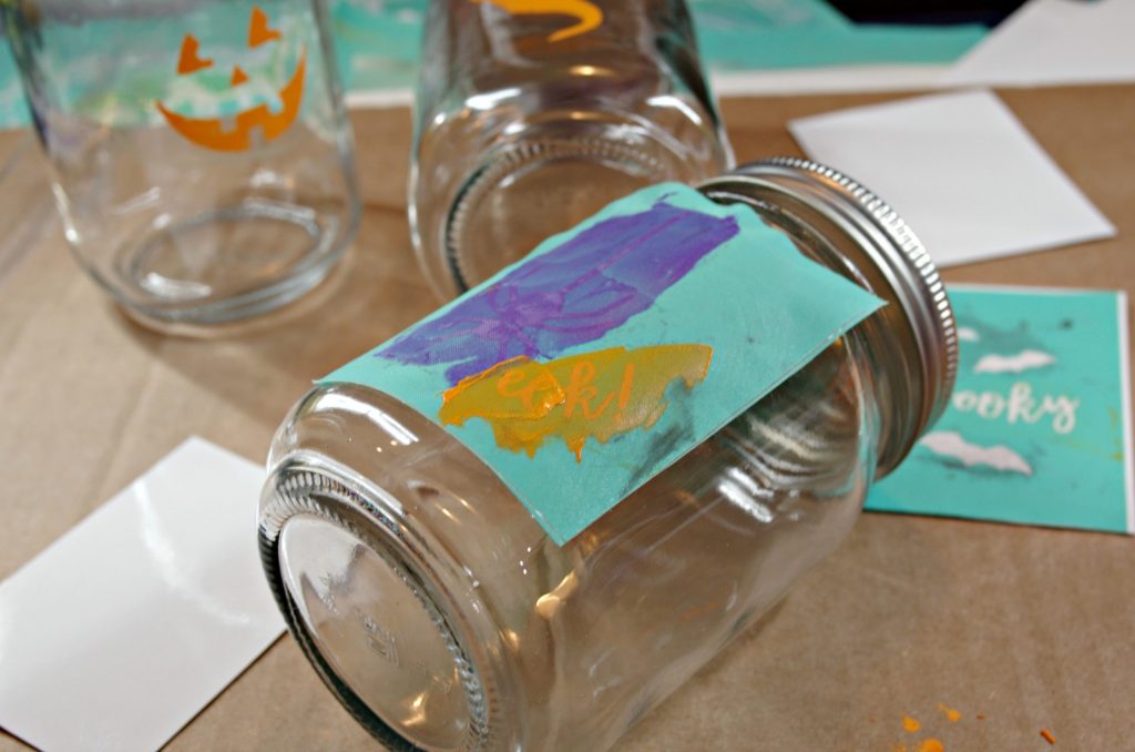 Apply chalk paste to make easy Halloween Mason Jars